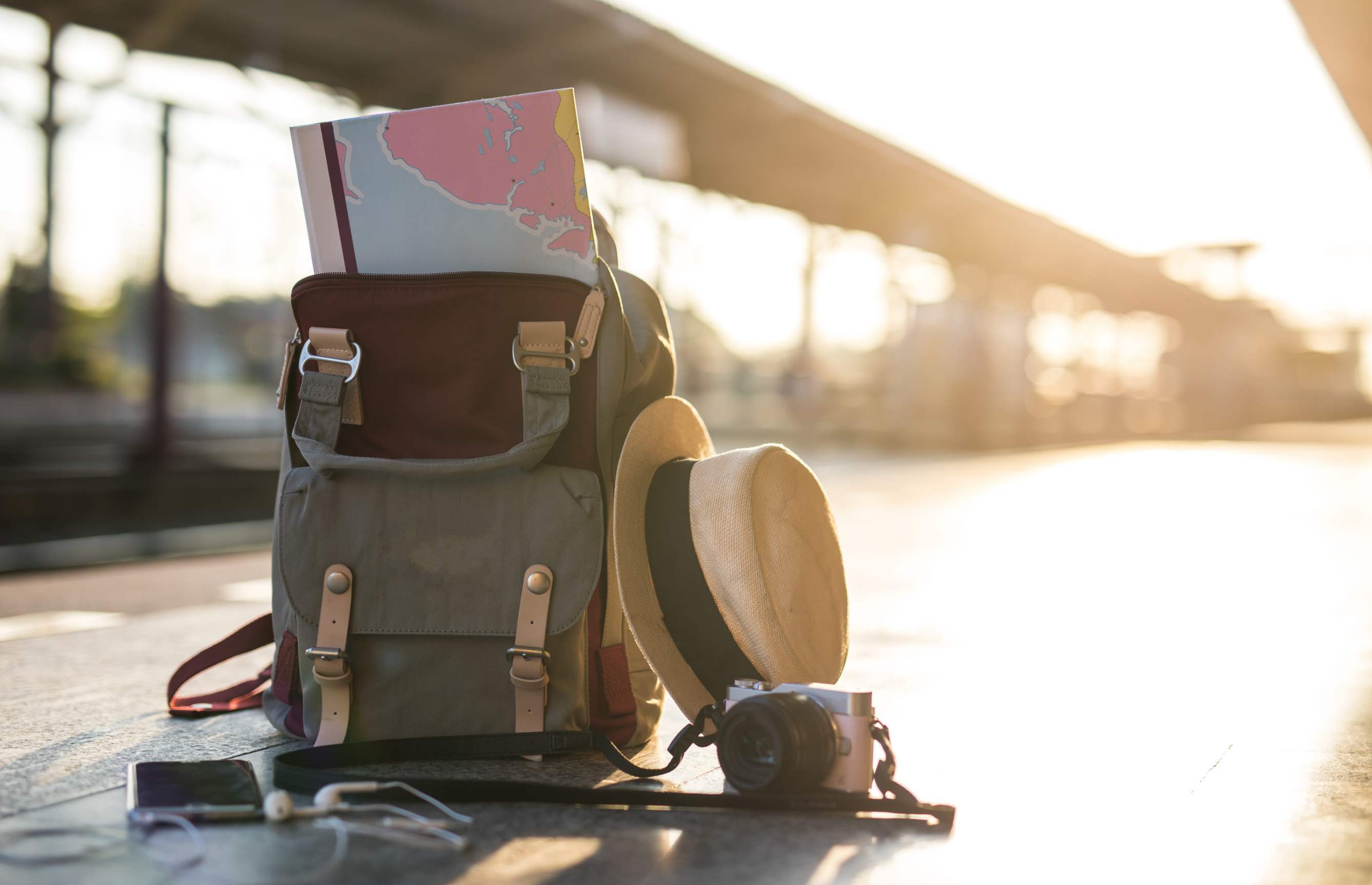 backpack on ground at train station